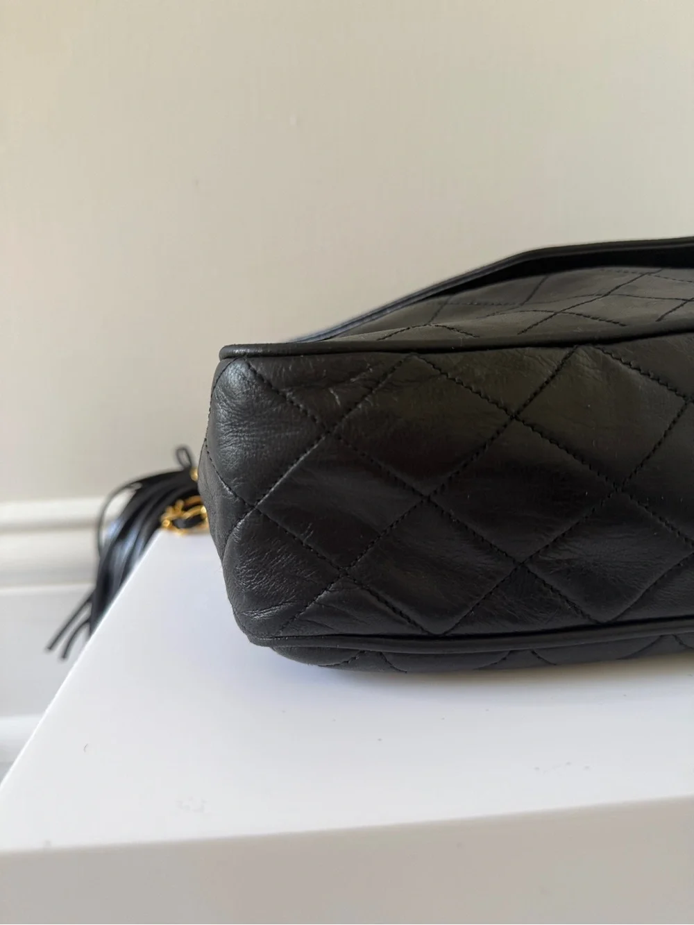 CHANEL Black Quilted Lambskin Crossbody with Gold Chain & Tassel